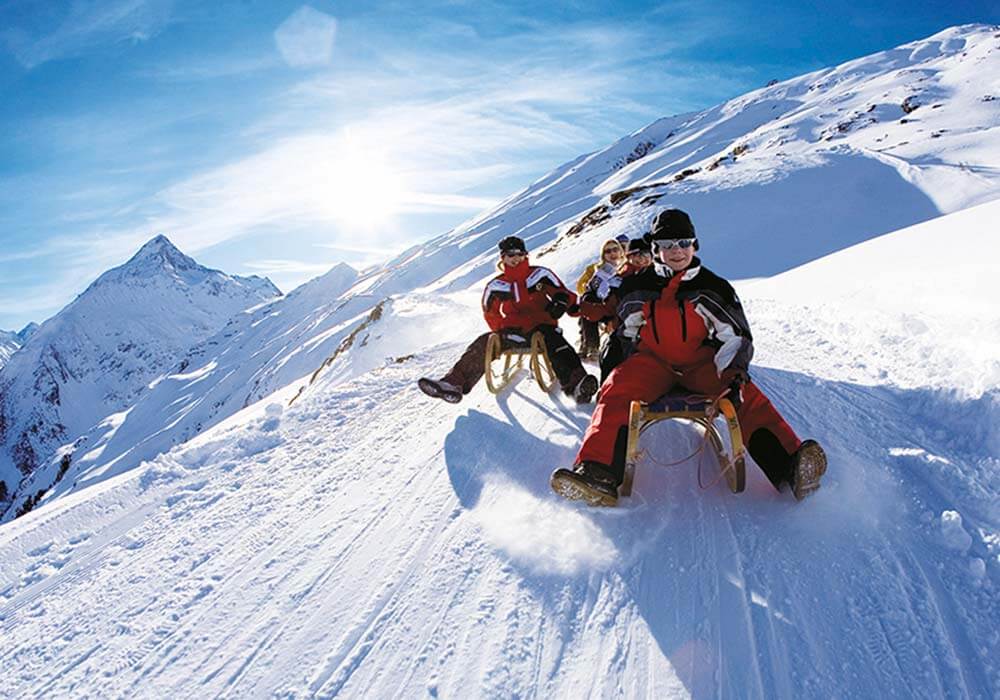 Rodeln und Schlittenfahren Winterurlaub im TOP Hotel Hochgurgl Ötztal Tirol